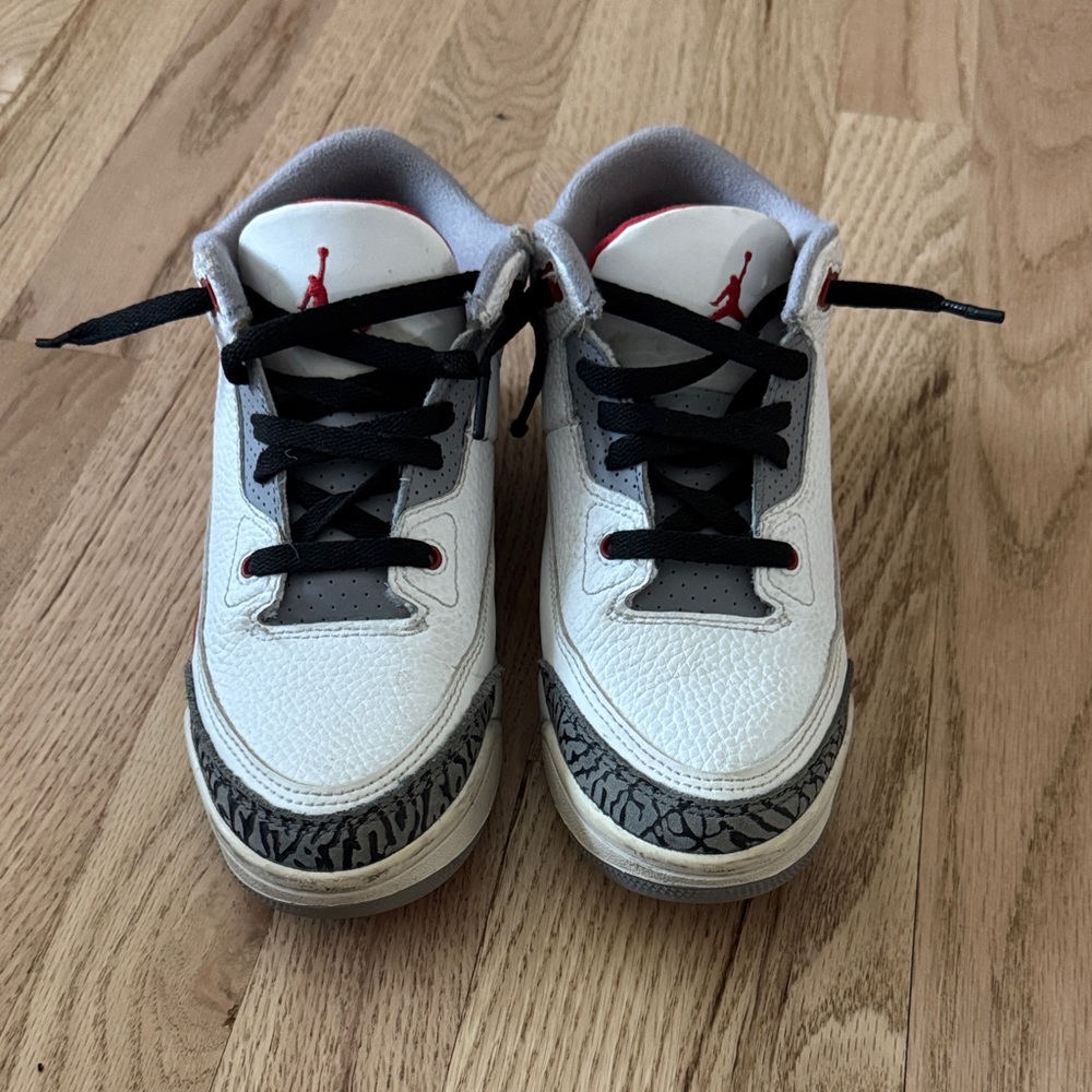 Kids Jordan White and Black Sneakers